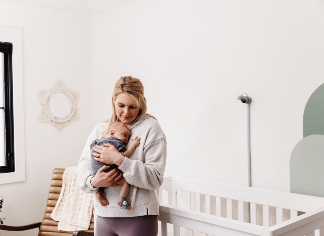 mum holding baby